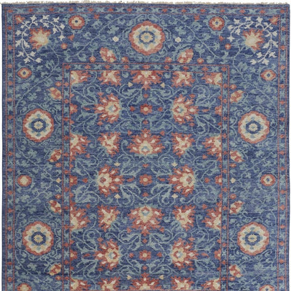 5' X 8' Blue And Red Wool Floral Hand Knotted Stain Resistant Area Rug