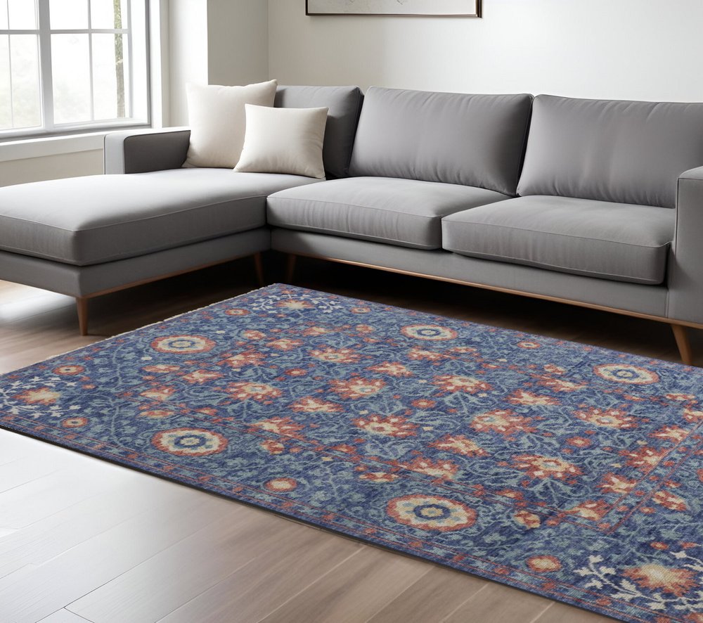 5' X 8' Blue And Red Wool Floral Hand Knotted Stain Resistant Area Rug