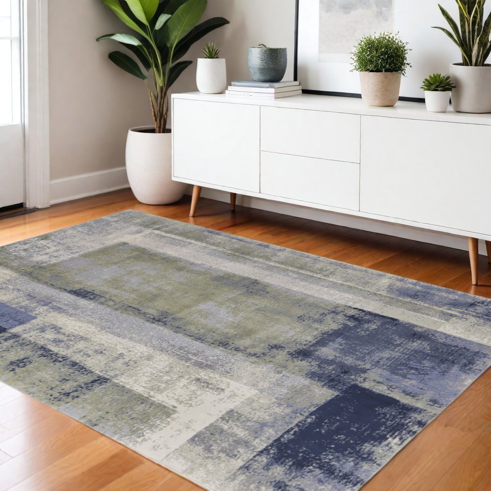 12' X 15' Blue Green And Ivory Abstract Distressed Area Rug