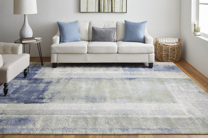 4' X 6' Blue Green And Ivory Abstract Distressed Area Rug