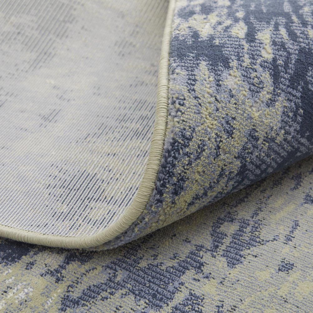 4' X 6' Blue Green And Ivory Abstract Distressed Area Rug