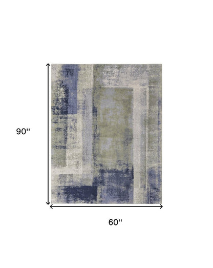 9' X 12' Blue Green And Ivory Abstract Distressed Area Rug