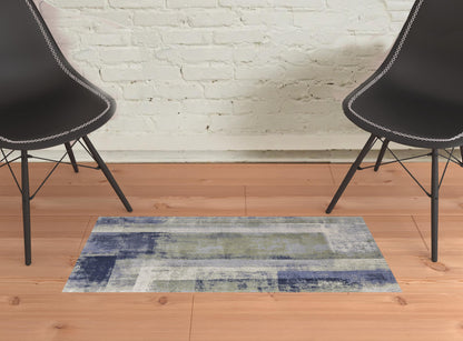 9' X 12' Blue Green And Ivory Abstract Power Loom Distressed Area Rug