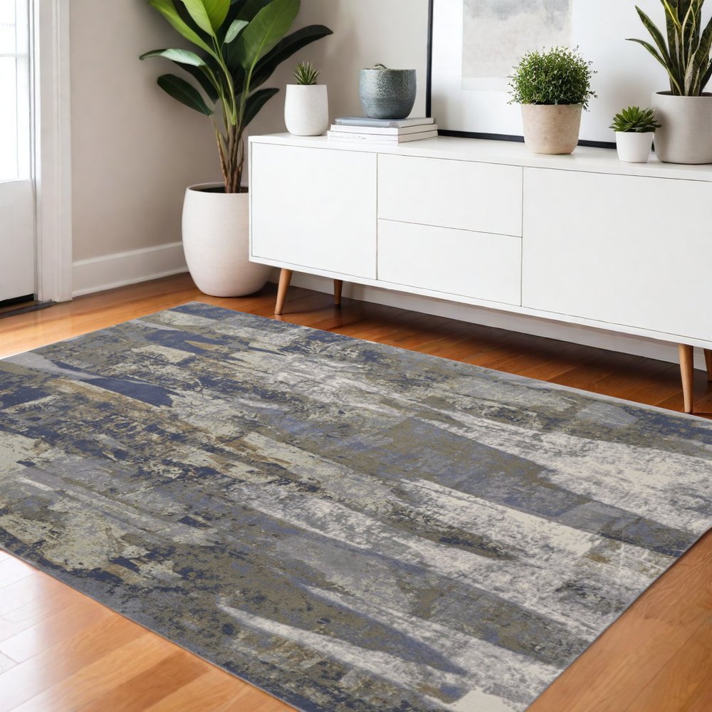 10' X 13' Brown Blue And Ivory Abstract Distressed Area Rug