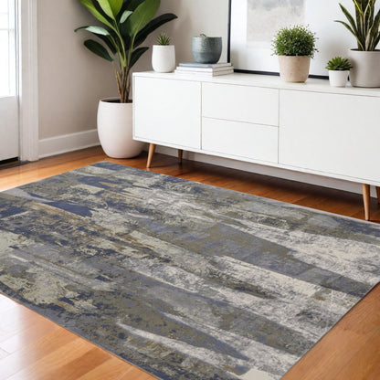 10' X 13' Brown Blue And Ivory Abstract Distressed Area Rug