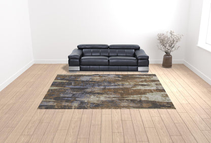 5' X 8' Blue Gray And Tan Abstract Power Loom Distressed Area Rug