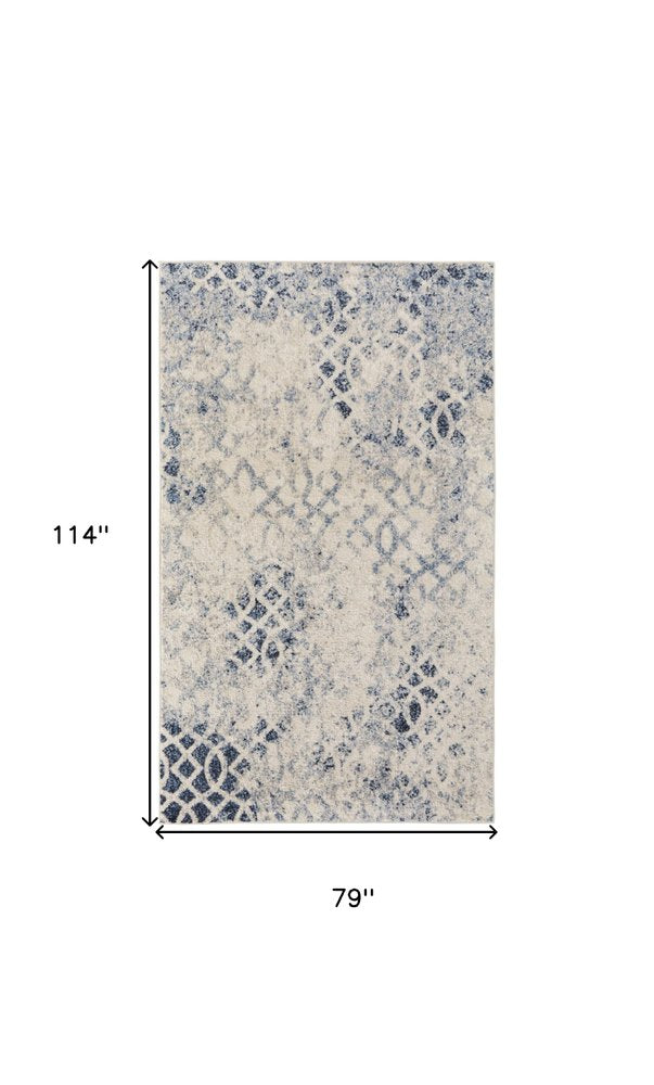 7' X 10' Ivory And Blue Abstract Power Loom Distressed Area Rug