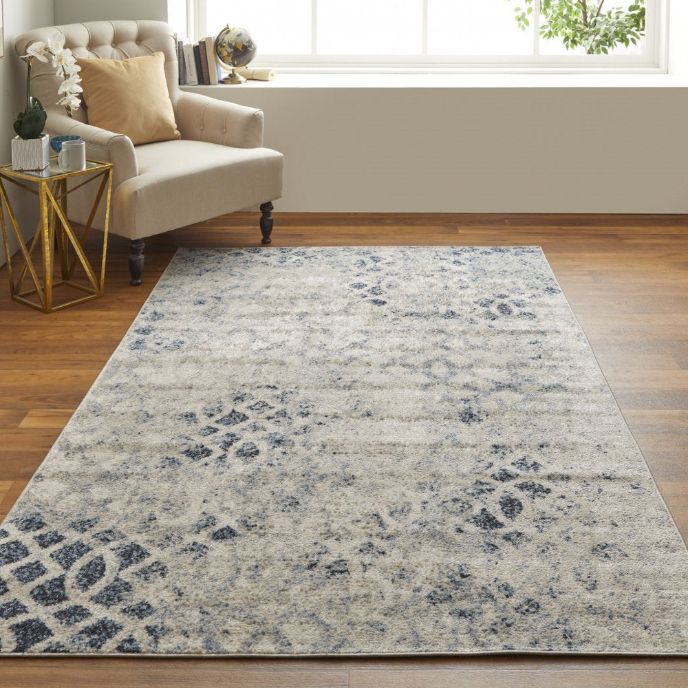 7' X 10' Ivory And Blue Abstract Power Loom Distressed Area Rug