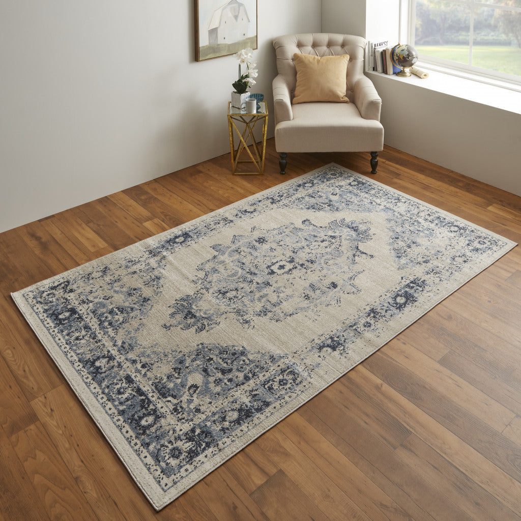 8' X 10' Ivory And Blue Floral Power Loom Distressed Area Rug