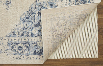 8' X 10' Ivory And Blue Floral Power Loom Distressed Area Rug