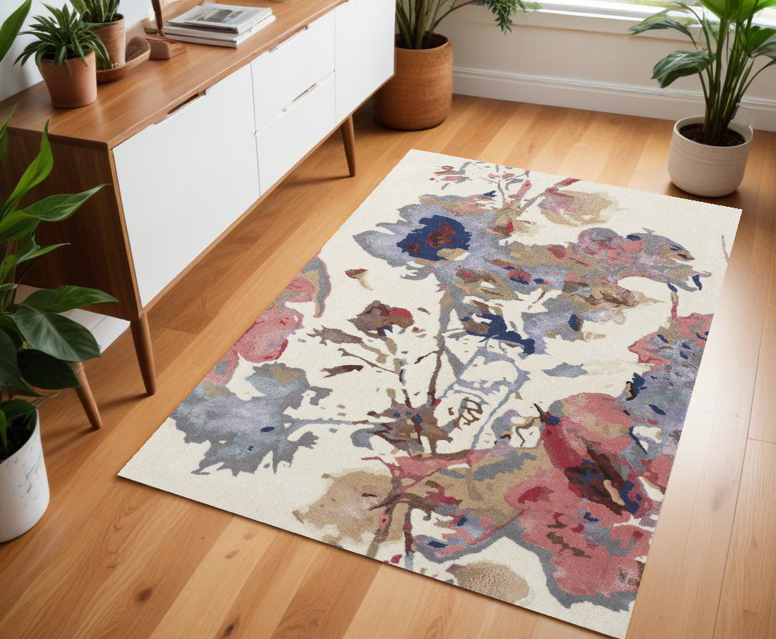 4' X 6' Ivory and Blue Wool Floral Hand Tufted Area Rug