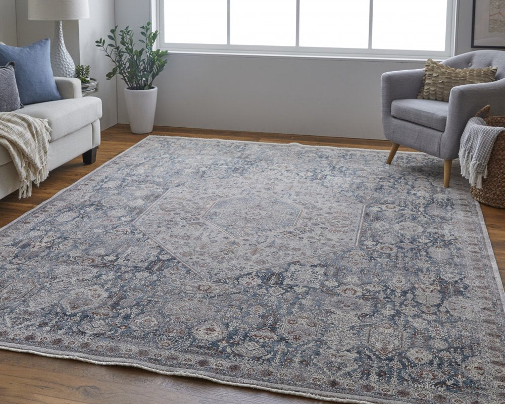 5' X 7' Blue and Ivory Floral Power Loom Area Rug