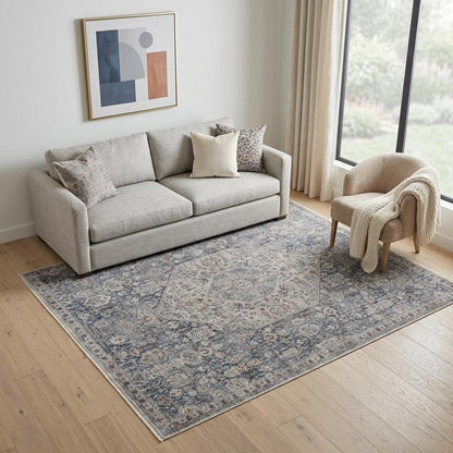 7' X 10' Blue And Ivory Floral Power Loom Stain Resistant Area Rug