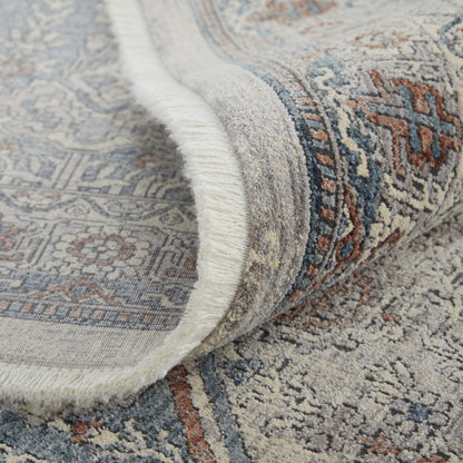 5' X 7' Blue and Ivory Floral Power Loom Area Rug