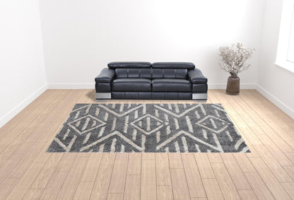 5' X 8' Gray And Ivory Geometric Power Loom Stain Resistant Area Rug