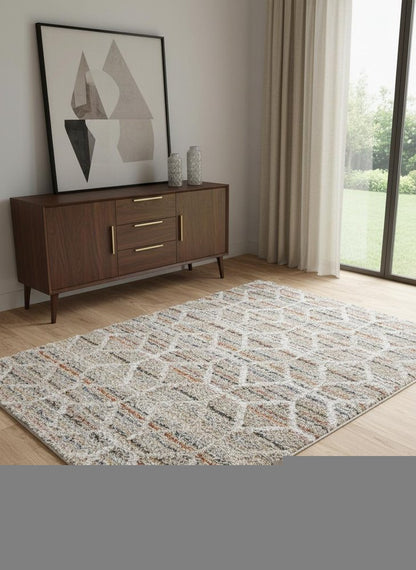 4' X 6' Tan Taupe And Ivory Geometric Power Loom Stain Resistant Area Rug