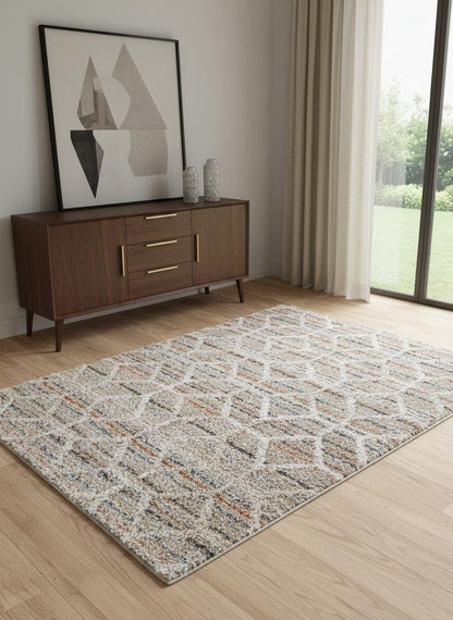 5' X 8' Blue And Ivory Geometric Power Loom Stain Resistant Area Rug