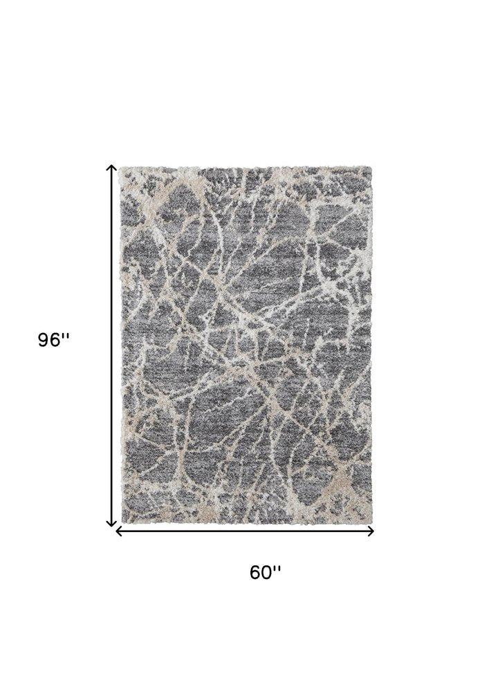 10' X 14' Gray And Ivory Abstract Power Loom Stain Resistant Area Rug