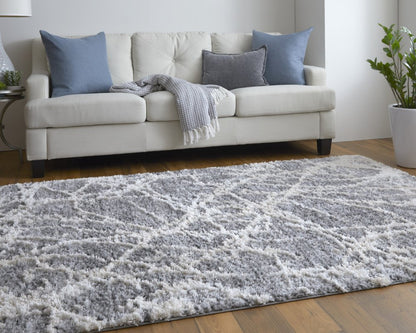 9' X 12' Gray And Ivory Abstract Power Loom Stain Resistant Area Rug