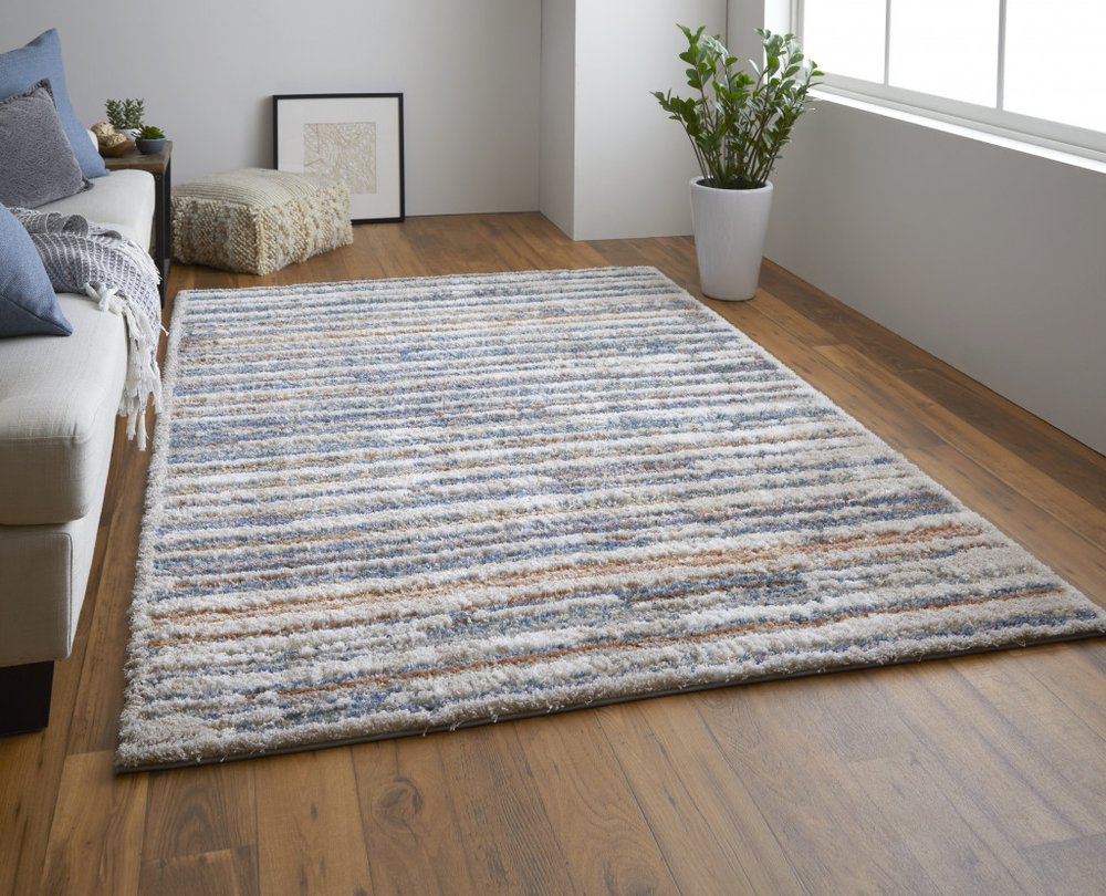 9' X 12' Ivory Blue And Orange Striped Power Loom Stain Resistant Area Rug