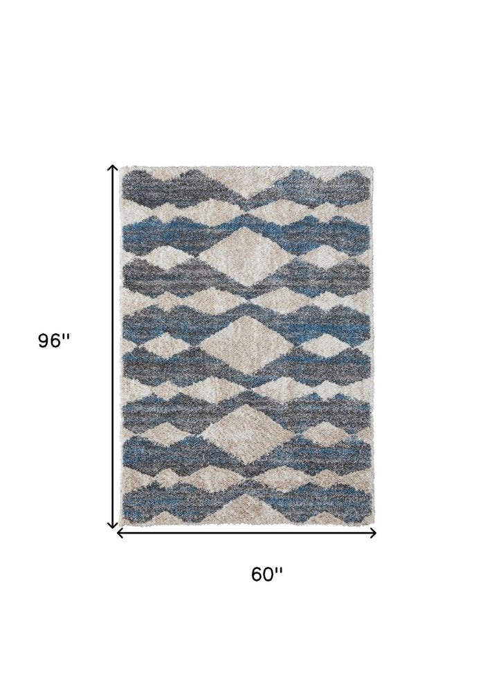 8' X 10' Ivory Gray And Blue Chevron Power Loom Stain Resistant Area Rug