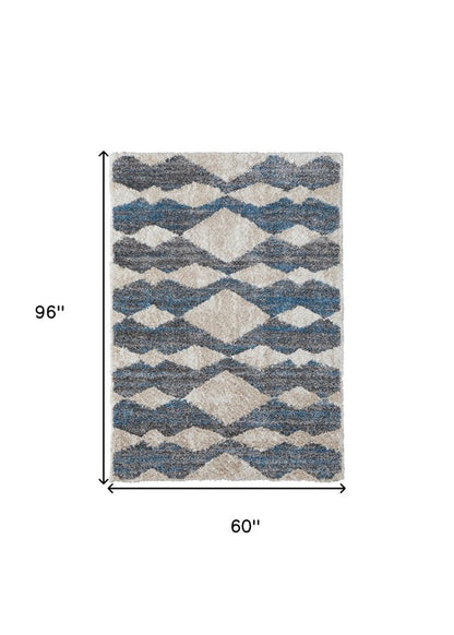 2' X 3' Tan Ivory And Blue Chevron Power Loom Stain Resistant Area Rug