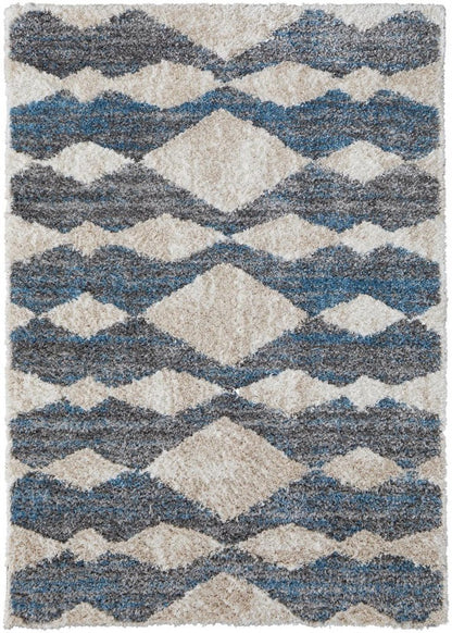 5' X 8' Tan Ivory And Blue Chevron Power Loom Stain Resistant Area Rug
