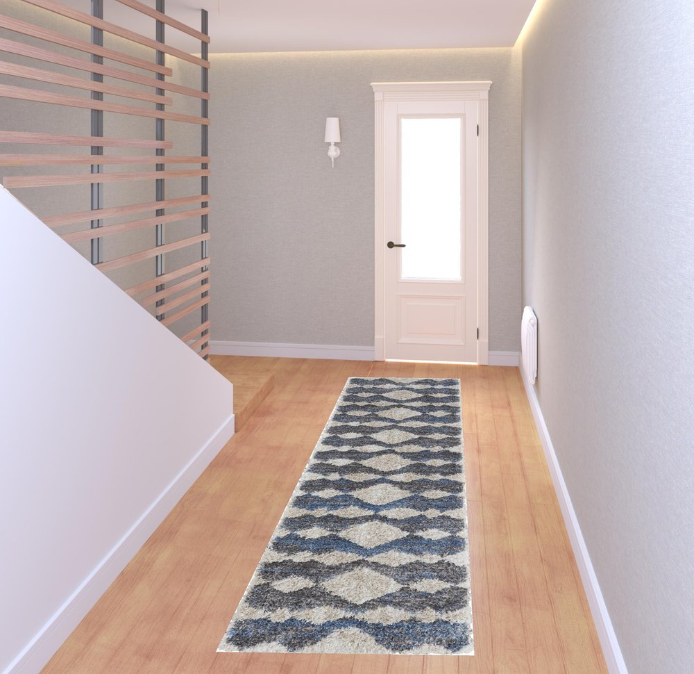 5' X 8' Ivory Gray And Blue Chevron Power Loom Stain Resistant Area Rug