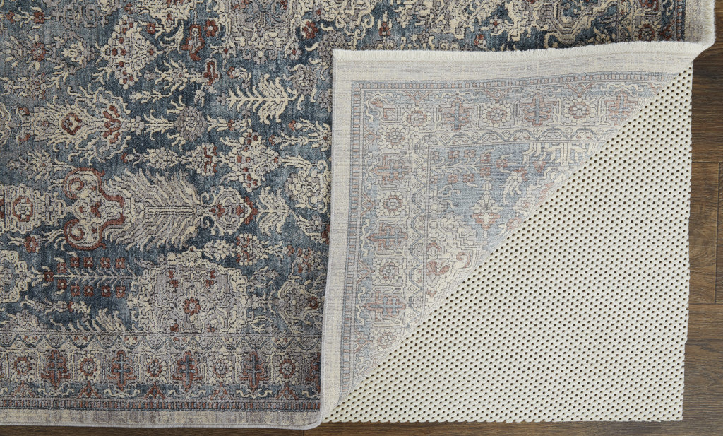 5' X 7' Blue And Ivory Floral Power Loom Stain Resistant Area Rug