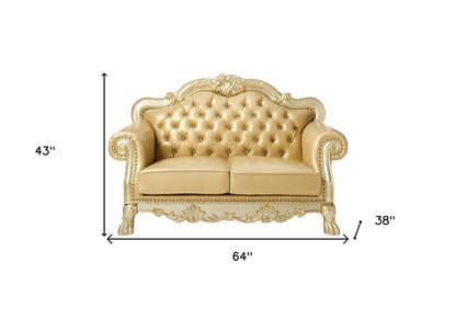 64" Bone And Gold Faux Leather Loveseat and Toss Pillows