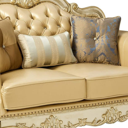 64" Bone And Gold Faux Leather Loveseat and Toss Pillows