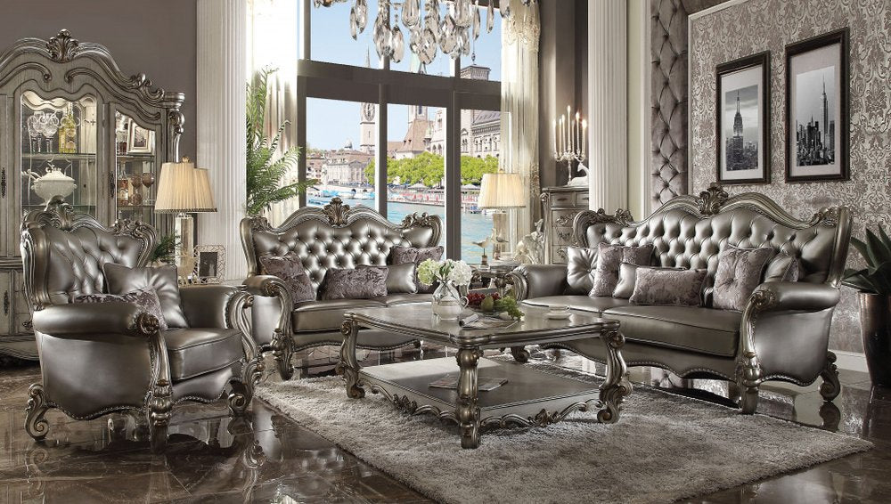 44" Silver and Platinum Faux Leather Tufted Wingback Chair And Toss Pillows