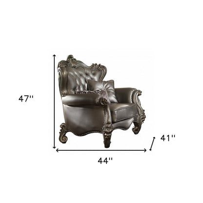 44" Silver and Platinum Faux Leather Tufted Wingback Chair And Toss Pillows