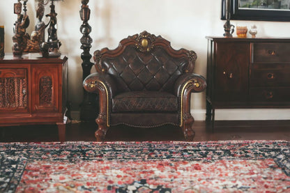 50" Chocolate Faux Leather Tufted Chesterfield Chair And Toss Pillow