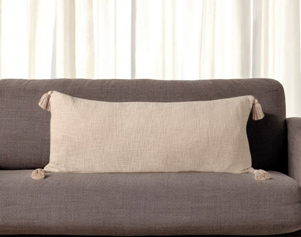 14" X 36" Beige Cotton Throw Pillow with Tassels