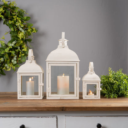 Set of Three Ivory Distressed Glass And Metal Floor Lantern Candle Holders