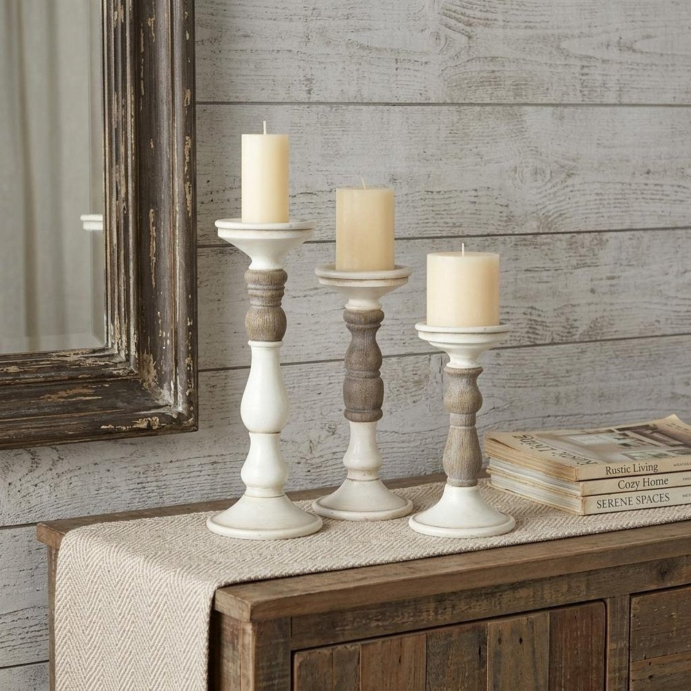 Set of Three Ivory and Natural Resin Tabletop Pillar Candle Holders