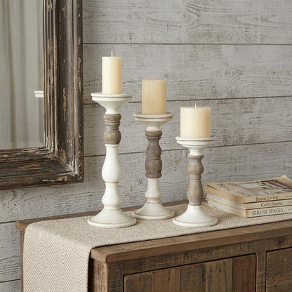Set of Three Ivory and Natural Resin Tabletop Pillar Candle Holders