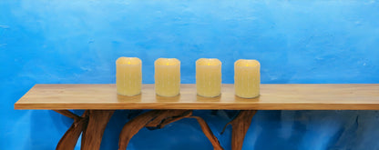 Set of Four Yellow Flameless Pillar Candle