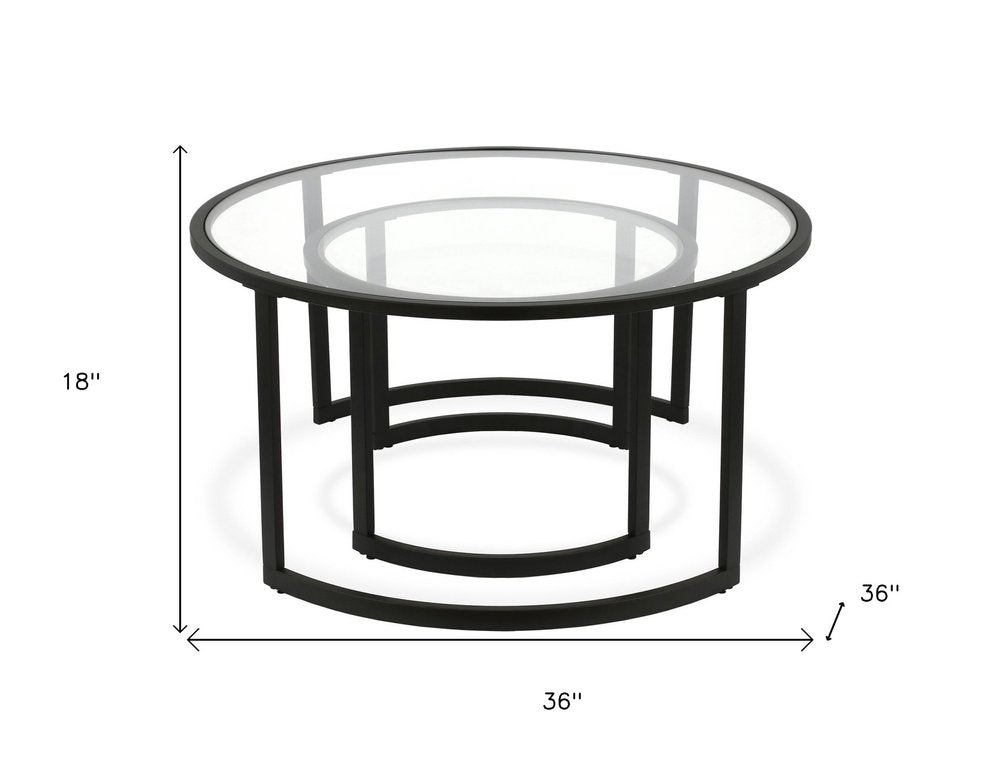 Set of Two Black Glass And Steel Round Sled Nested Coffee Tables