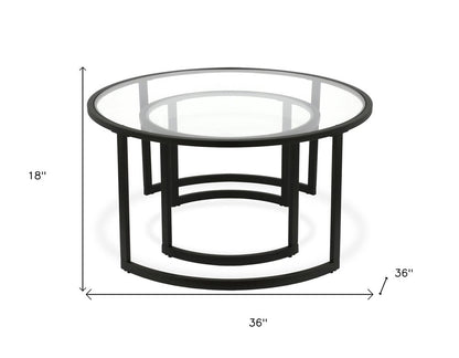 Set of Two Black Glass And Steel Round Sled Nested Coffee Tables