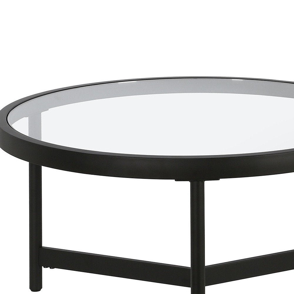 Set of Two 30" Black Glass And Steel Round Nested Coffee Tables