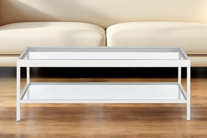 45" Clear Glass And White Steel Coffee Table With Shelf