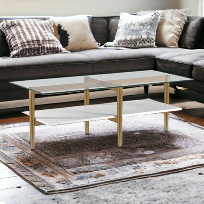 47" Gold Glass And Steel Coffee Table With Shelf