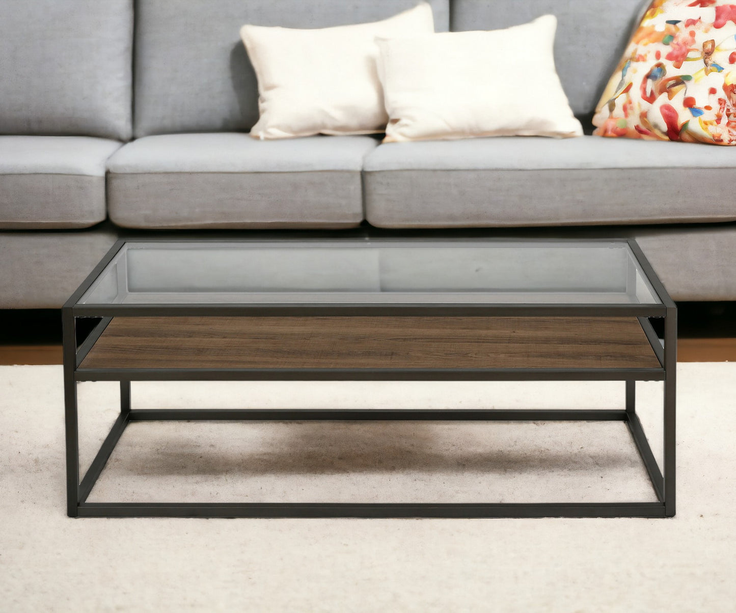 46" Black and Clear Glass And Steel Coffee Table With Shelf