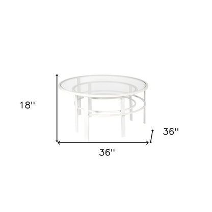 Set of Two 36" White Glass And Steel Round Nested Coffee Tables