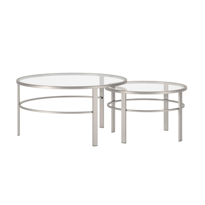 Set of Two 36" Clear and Silver Glass And Steel Round Nested Coffee Tables