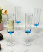 Set of Four Clear and Blue Acrylic Stemmed Flutes