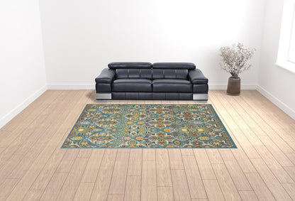 9' X 12' Teal and Gold Floral Power Loom Area Rug