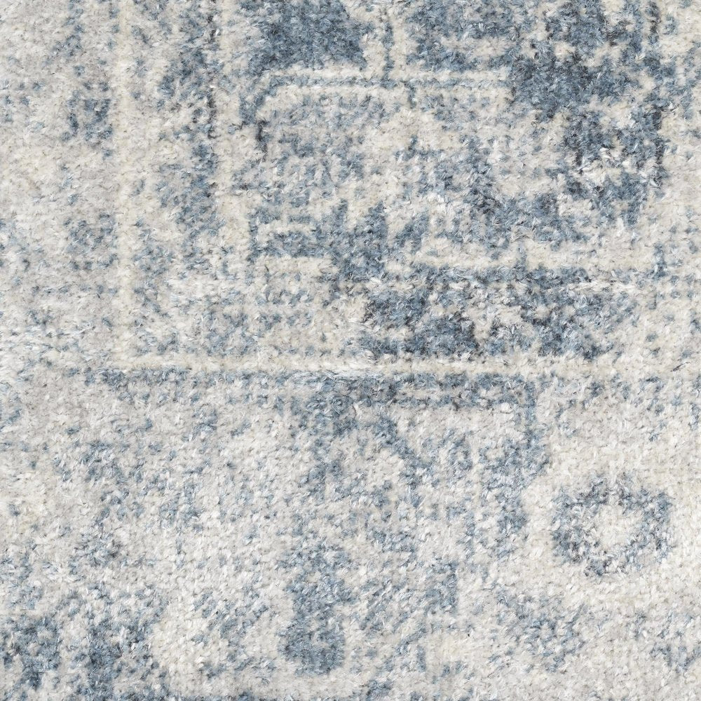 9' X 12' Blue and Ivory Oriental Power Loom Distressed Area Rug
